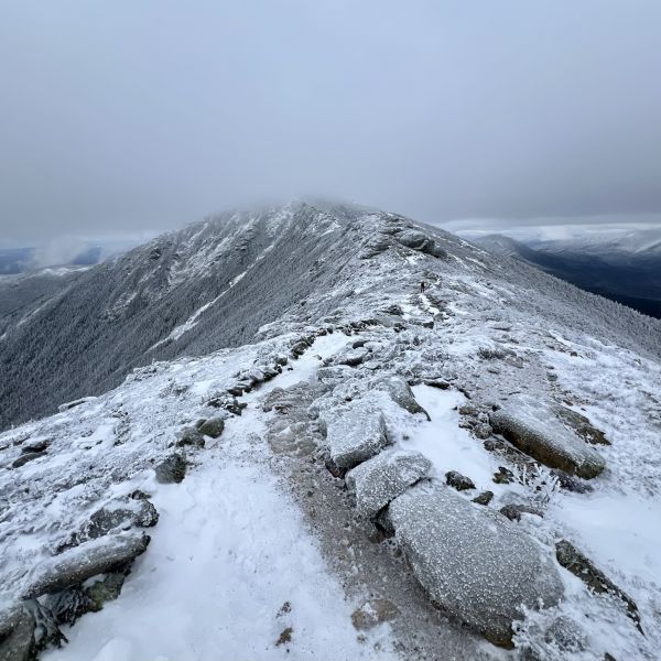 Photograph by Dustin Hilt: Hiker en route to Mount Lincoln in January 2024